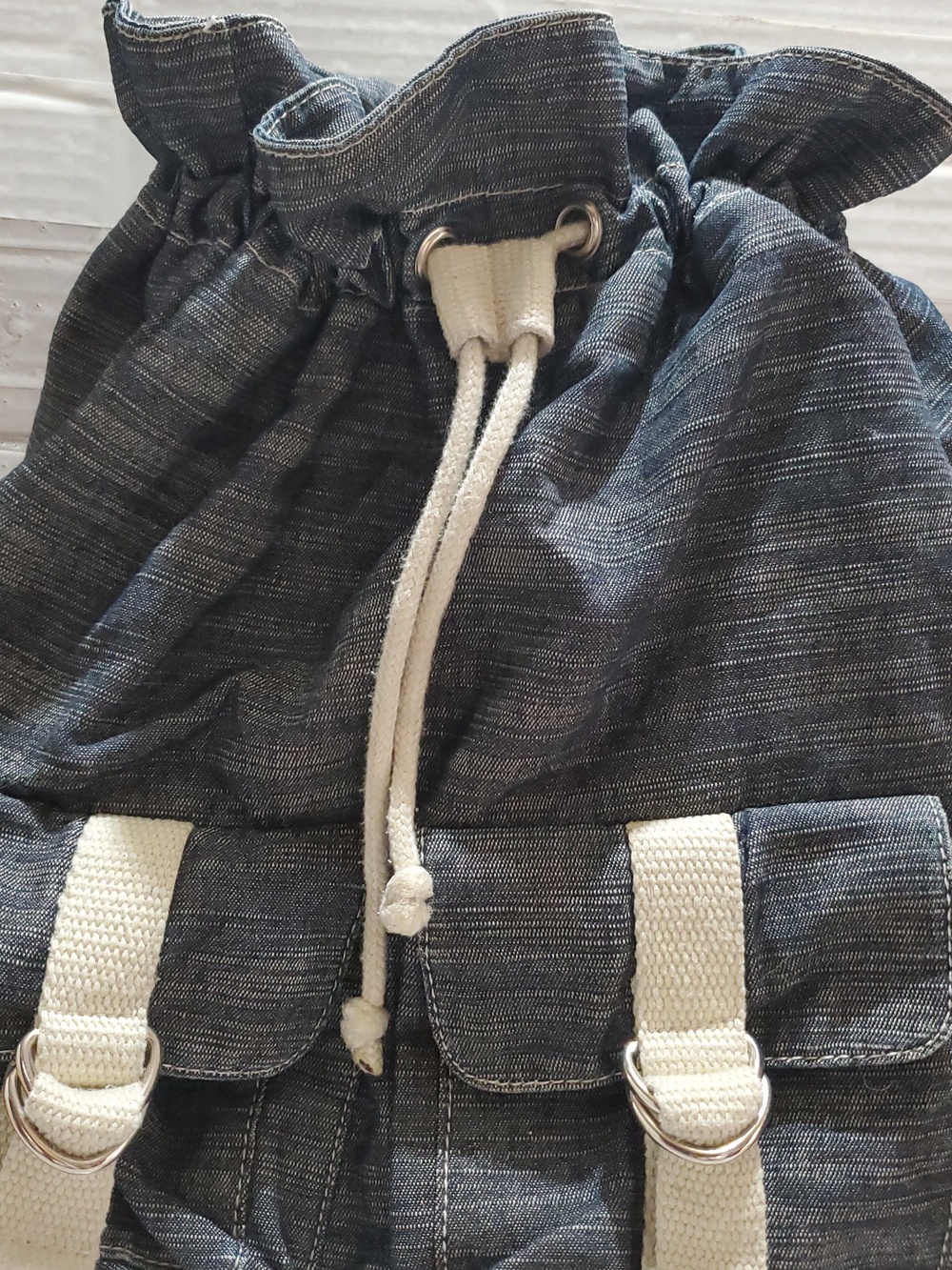 Denim-Look Drawstring Backpack with Cream Strap Details - Picture 5 of 12